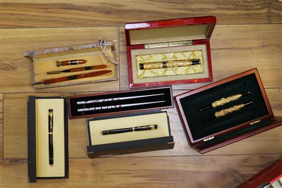 A collection of fountain pens and writing equipment